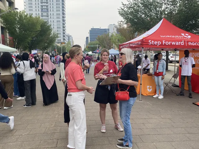 Group of Forever Canadian volunteers gathered at a community event.
