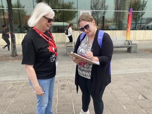 Volunteers smiling together while promoting the petition.